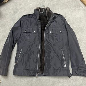 Stunning Excellent Condition Andrew Marc Jacket with Faux Fur inside.